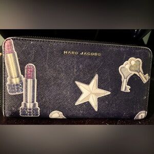 Marc Jacob’s continental wallet. Tossed charms